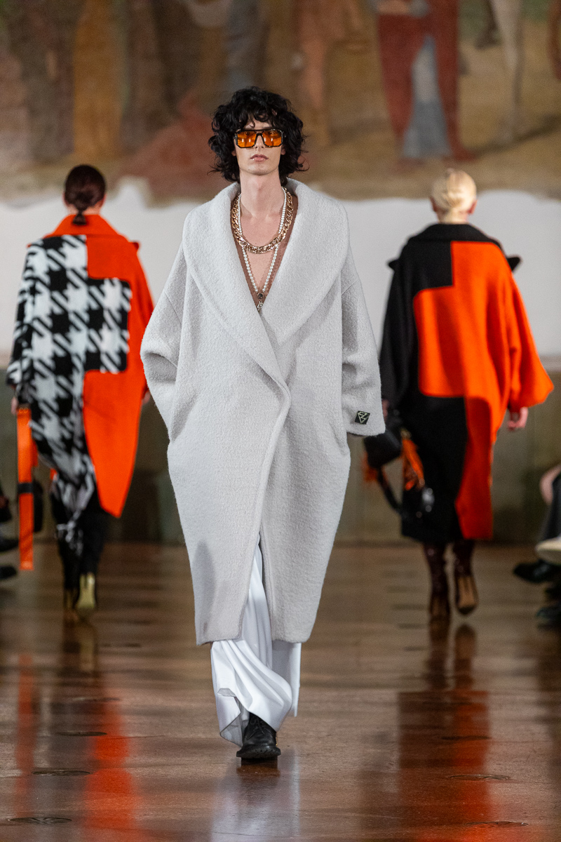 Runway look: male model in oversized light grey wool coat